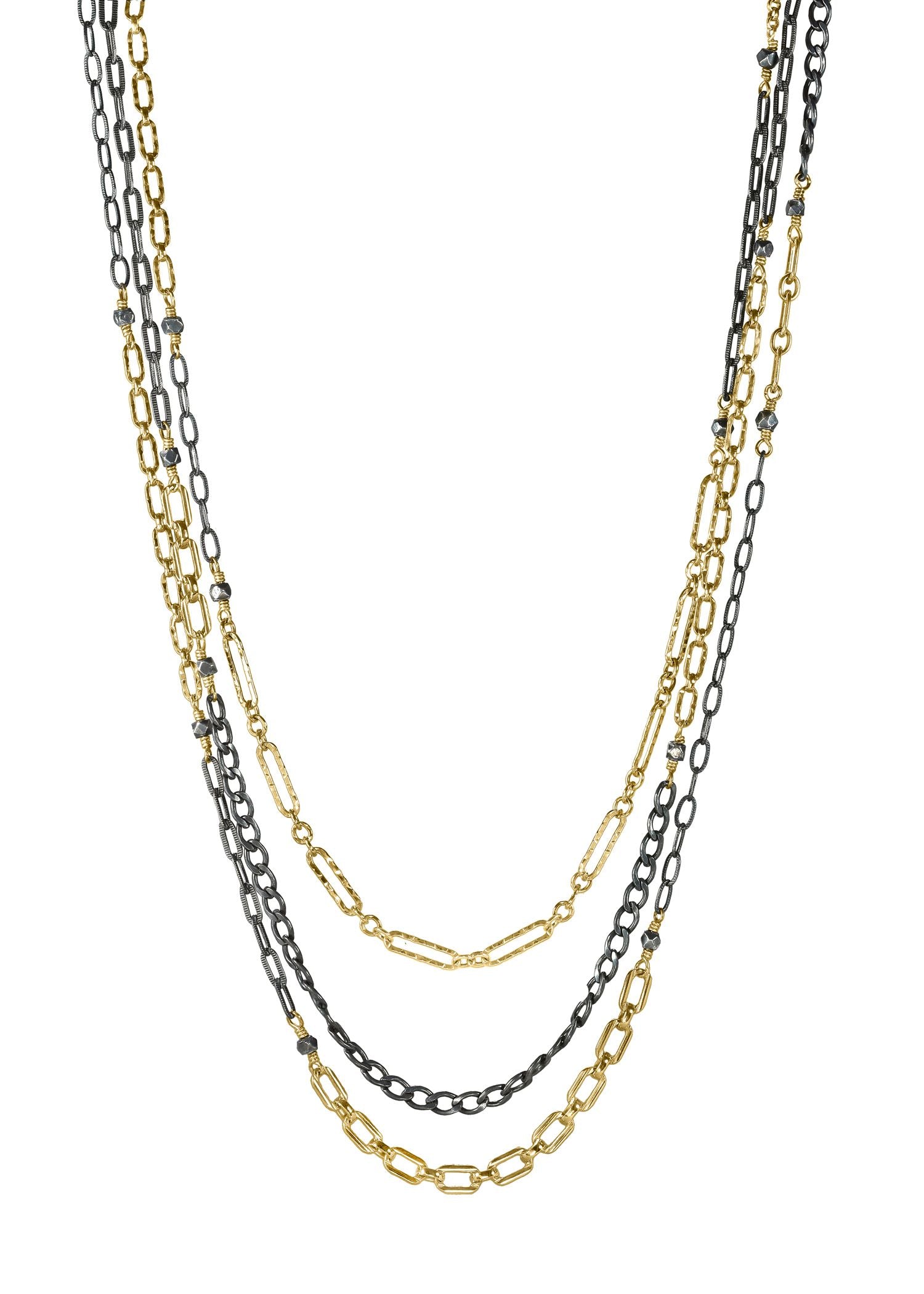 14k gold fill Blackened sterling silver Mixed metal Necklace chains measure 14-1/2”, 15-1/2” and 16-1/4” in length 14-1/2" (inner) 15-1/2" (middle) 16-1/4" (outer) Handmade in our Los Angeles studio