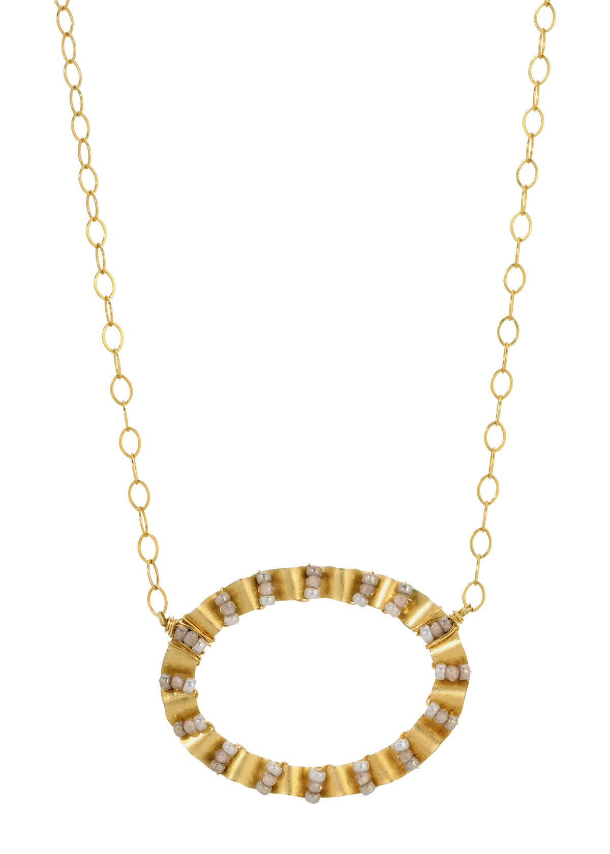 Edwina necklace with white zircon seed beads in a hand-wrought, ruffled 14k gold fill frame on a chain.