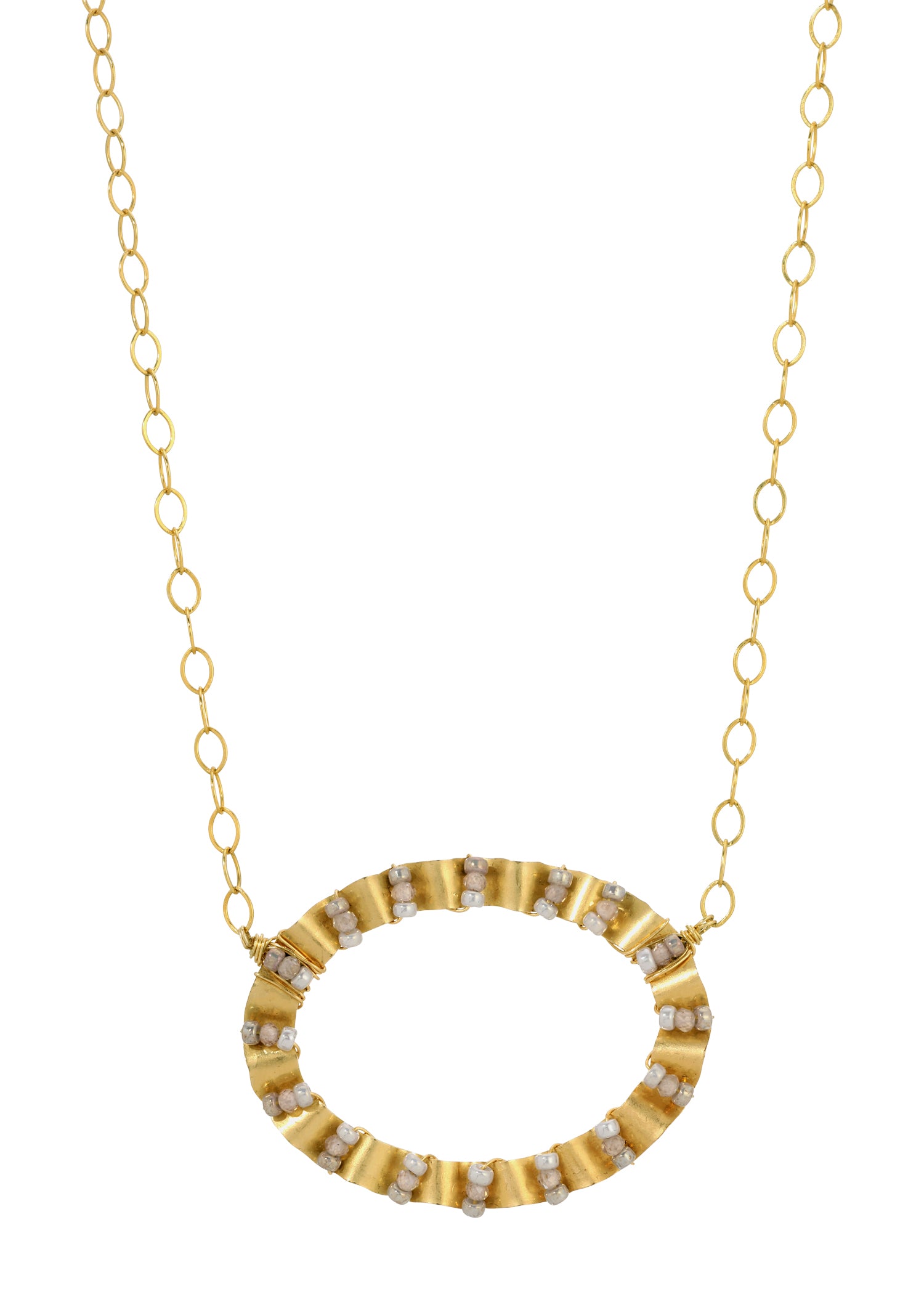 Edwina necklace with white zircon seed beads in a hand-wrought, ruffled 14k gold fill frame on a chain.