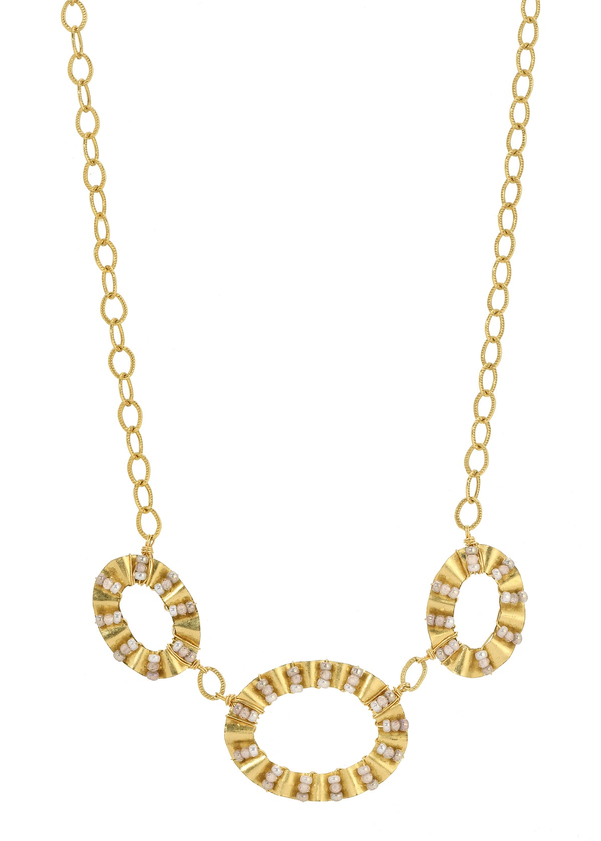 Triple necklace with white zircon seed beads in 14k gold fill hand-ruffled frames on a gold chain.