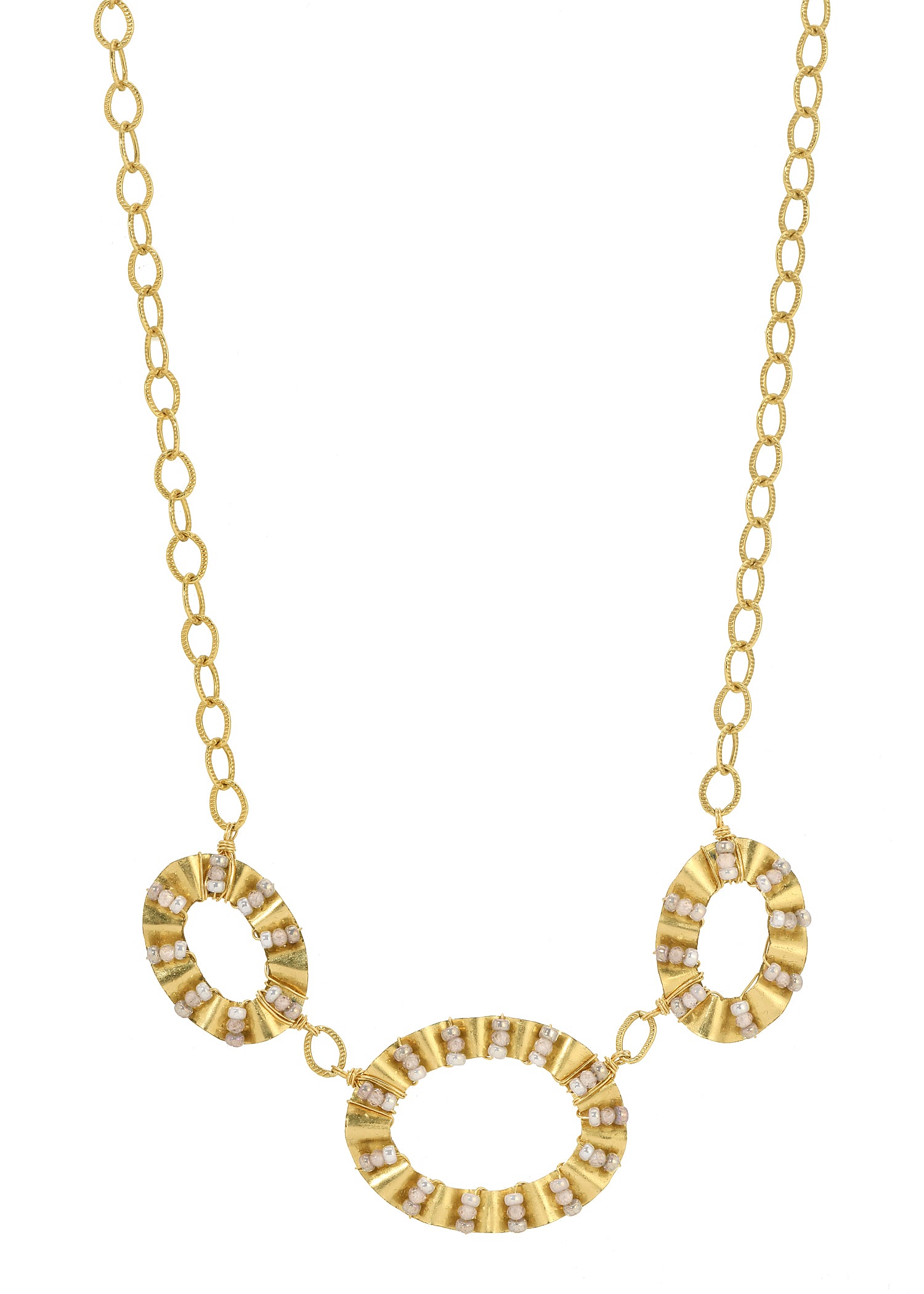 Triple necklace with white zircon seed beads in 14k gold fill hand-ruffled frames on a gold chain.