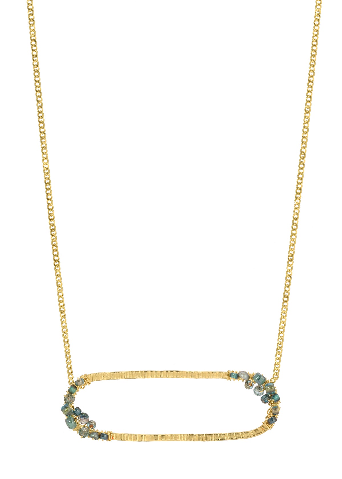 Juniper cluster necklace in 14k gold fill with green crystal, seed pearl, and seed bead clusters on a textured pendant.