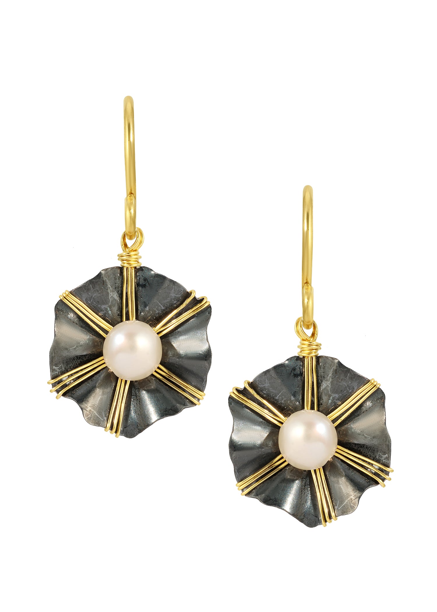 Freshwater pearl earrings in blackened sterling silver and 14k gold fill with hand wire-wrapped flower shapes.