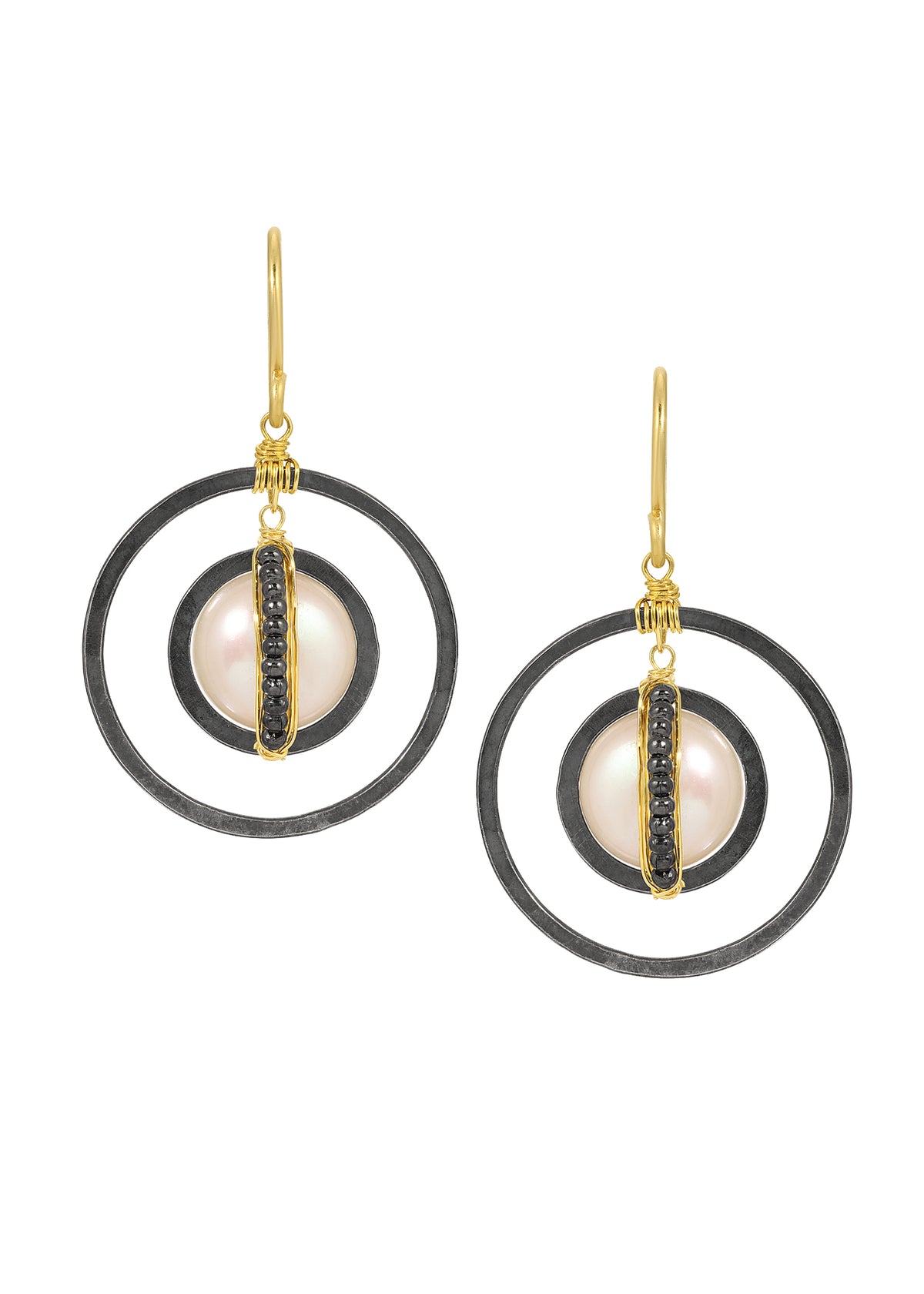Freshwater pearl and hematite earrings in 14k gold fill and blackened sterling silver with hand wire-wrapped hoops.