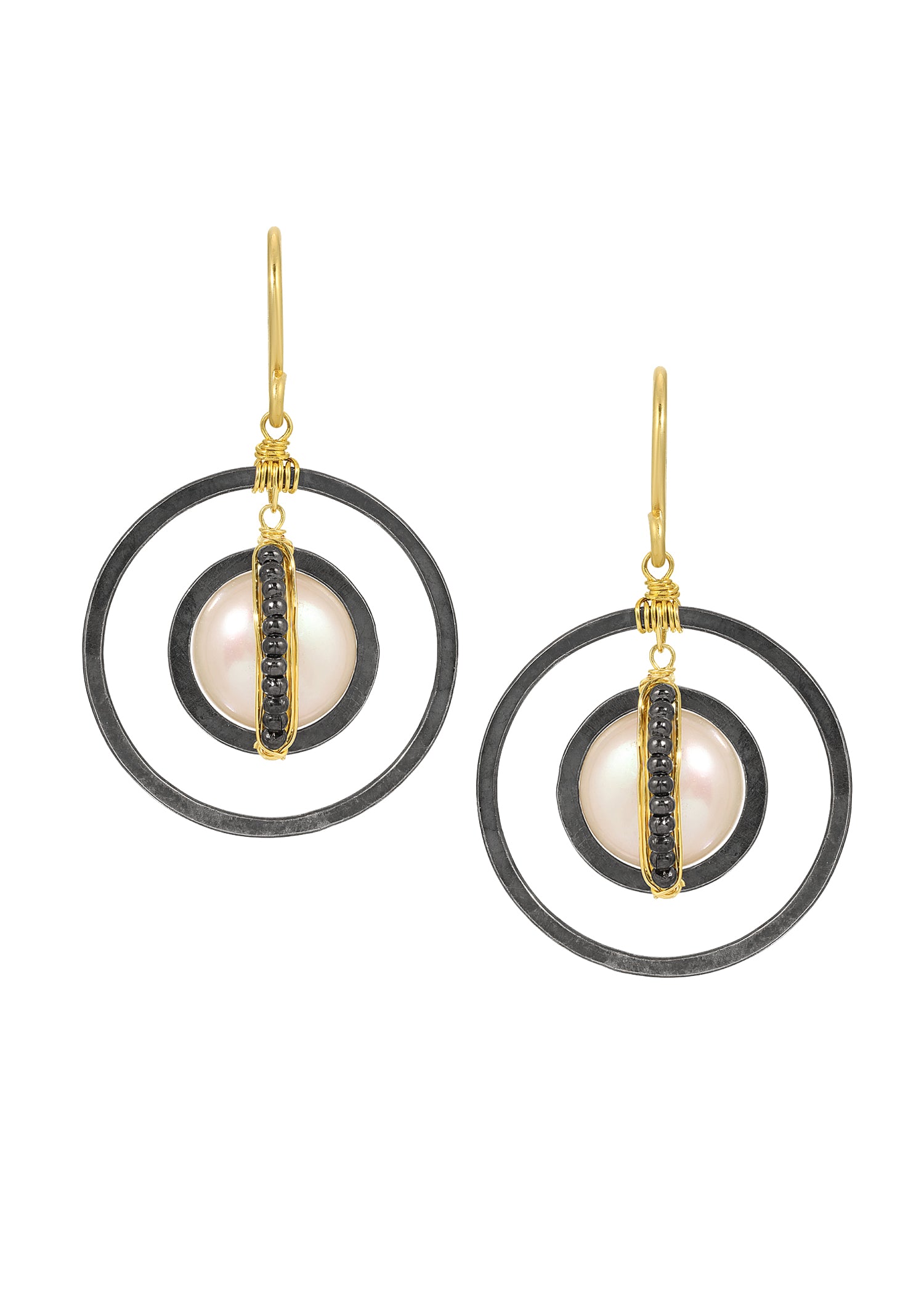 Freshwater pearl and hematite earrings in 14k gold fill and blackened sterling silver with hand wire-wrapped hoops.