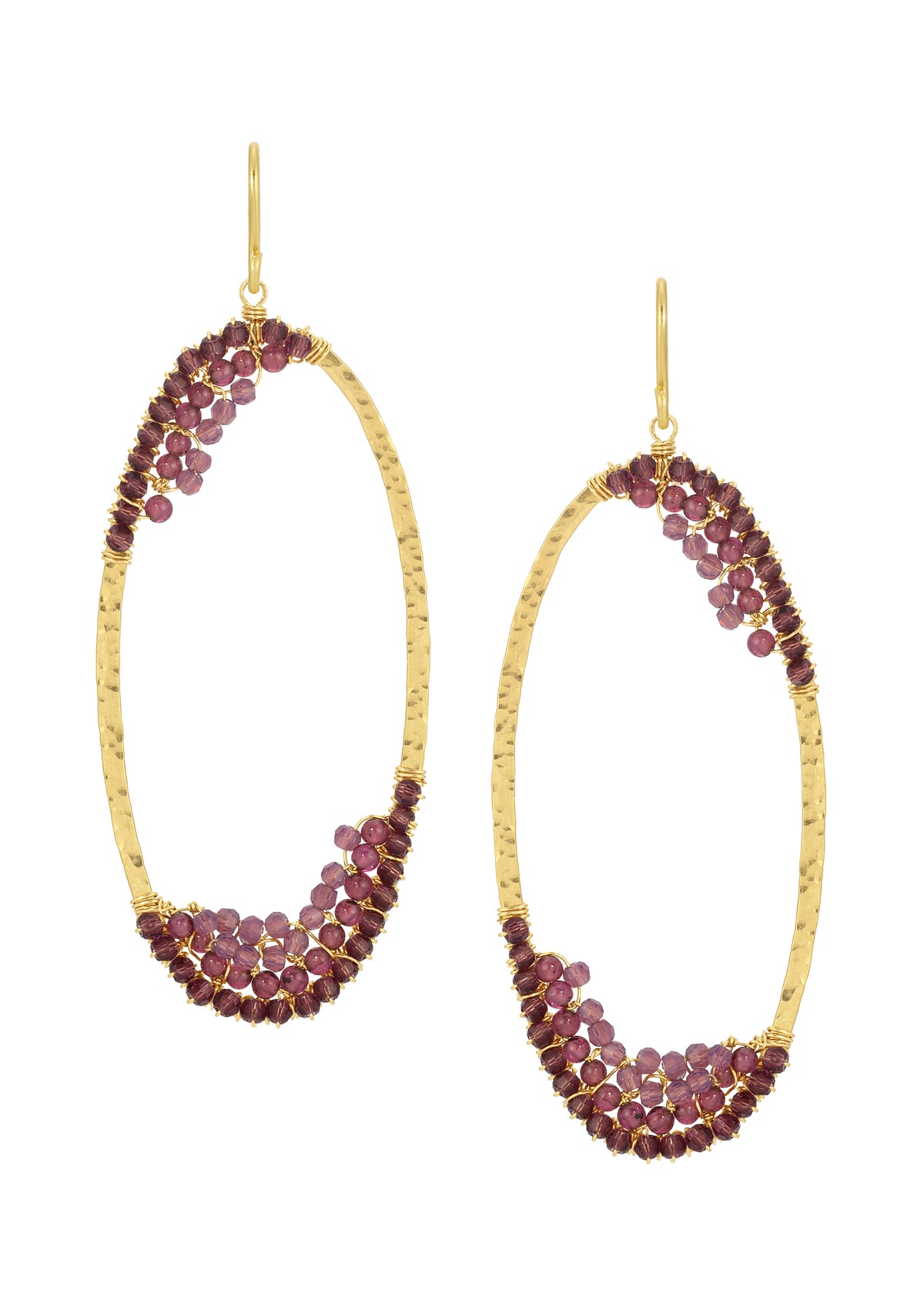 Oval hoop earrings with hand wire-wrapped purple garnet and crystal on 14k gold fill, featuring a hammered metal texture.