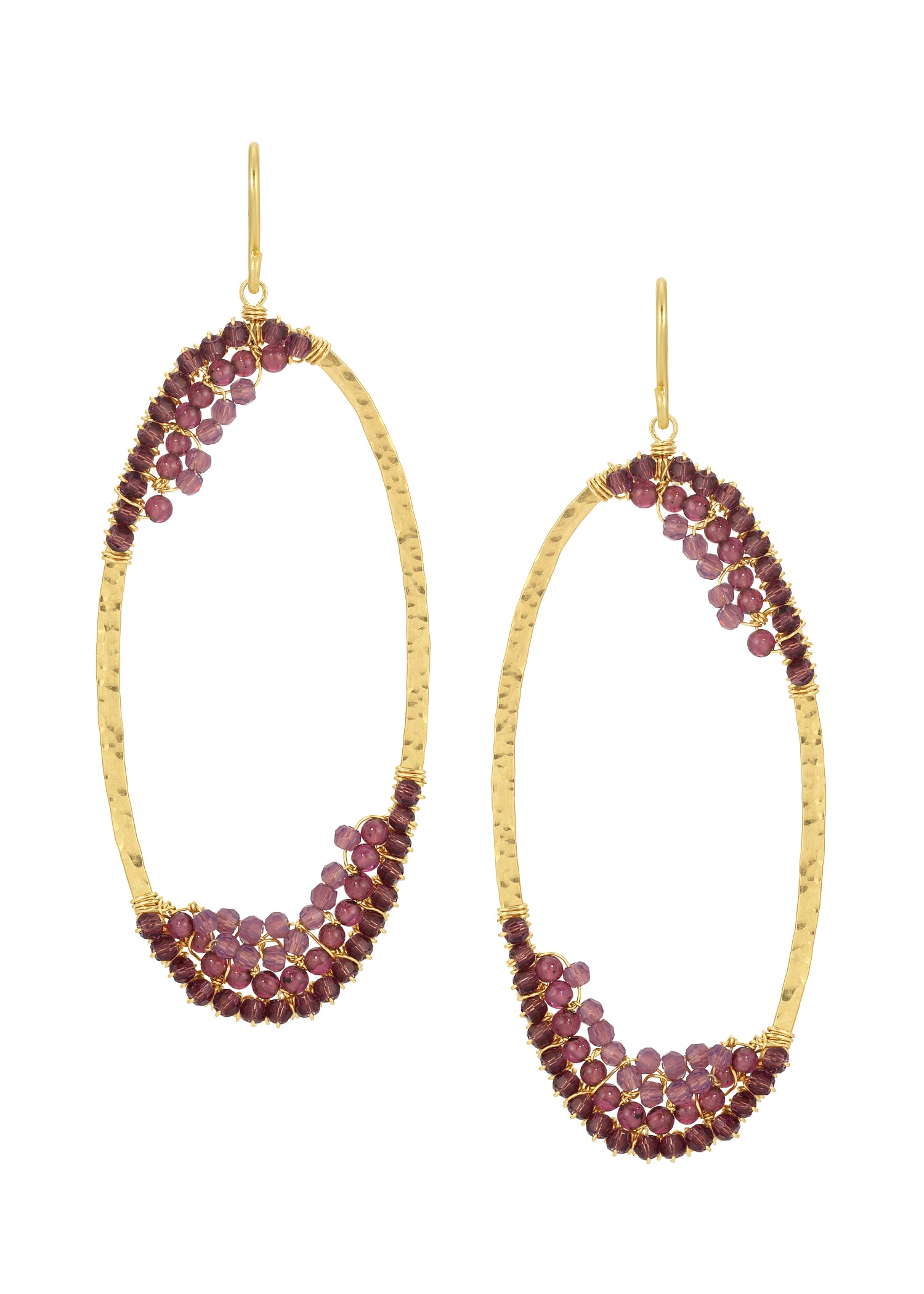 Oval hoop earrings with hand wire-wrapped purple garnet and crystal on 14k gold fill, featuring a hammered metal texture.