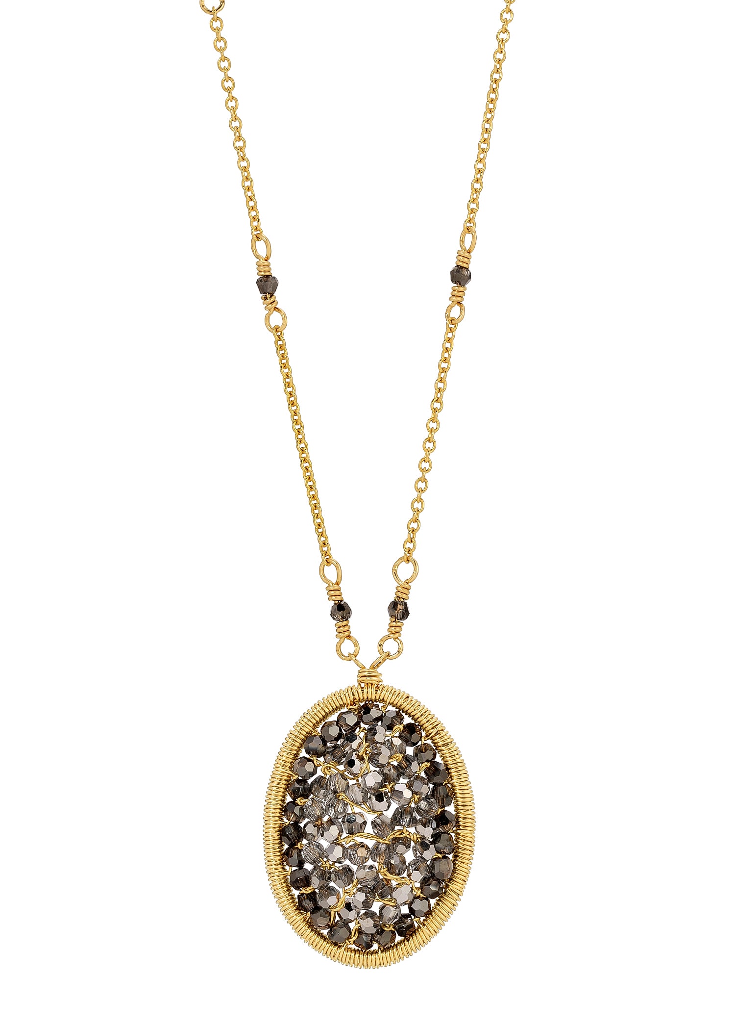 Oval crystal necklace in 14k gold fill with hand wire-wrapped charcoal metallic crystals in an oval pendant.