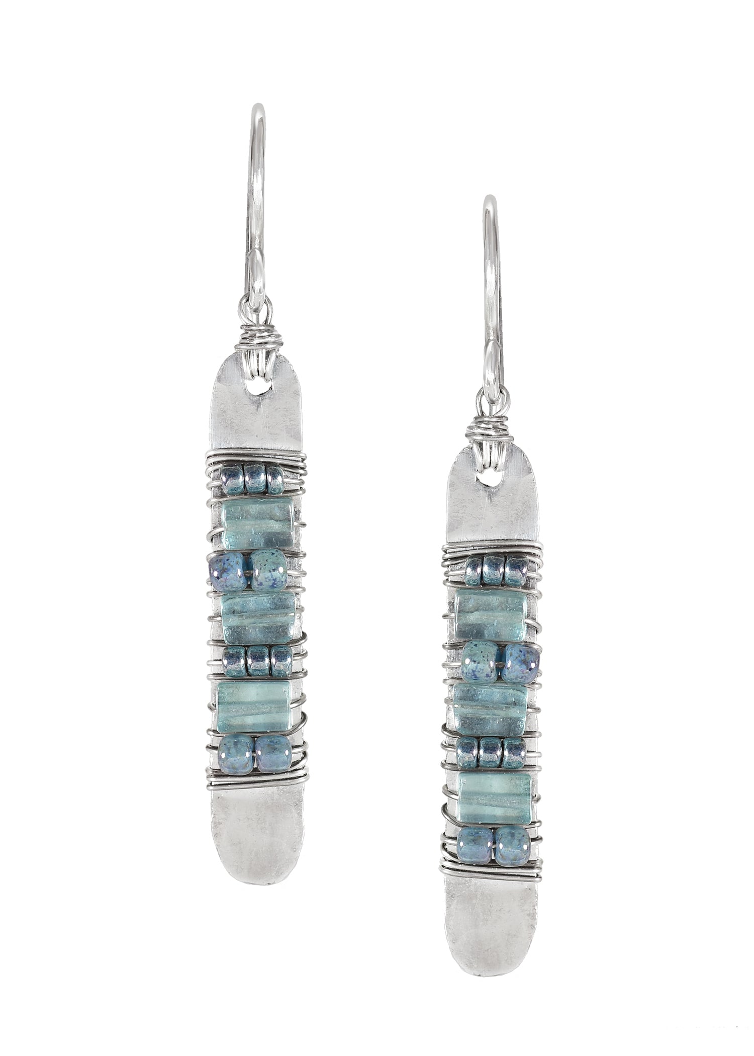Apatite seed bead earrings in sterling silver, hand wire-wrapped in a long, narrow rectangular shape with tonal blue beads.