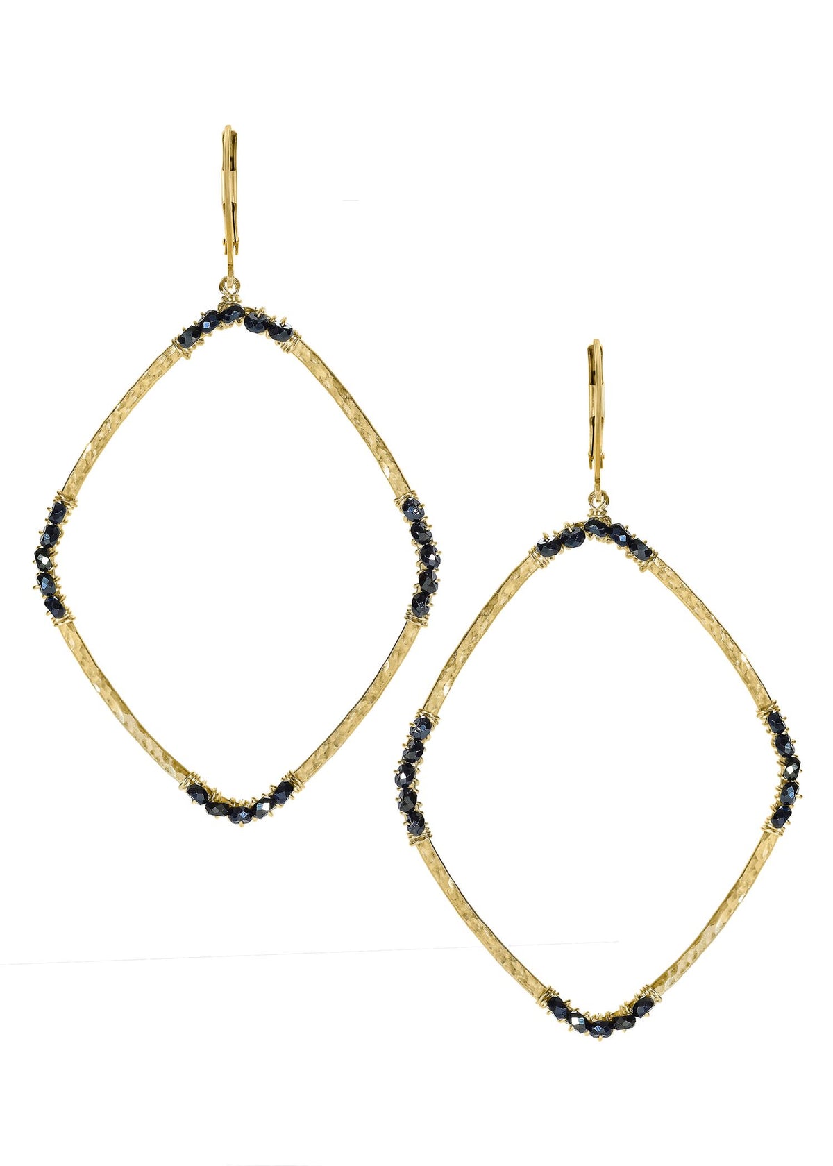 Black spinel earrings in 14k gold fill with hand wire-wrapped faceted stones on large, textured geometric hoops.