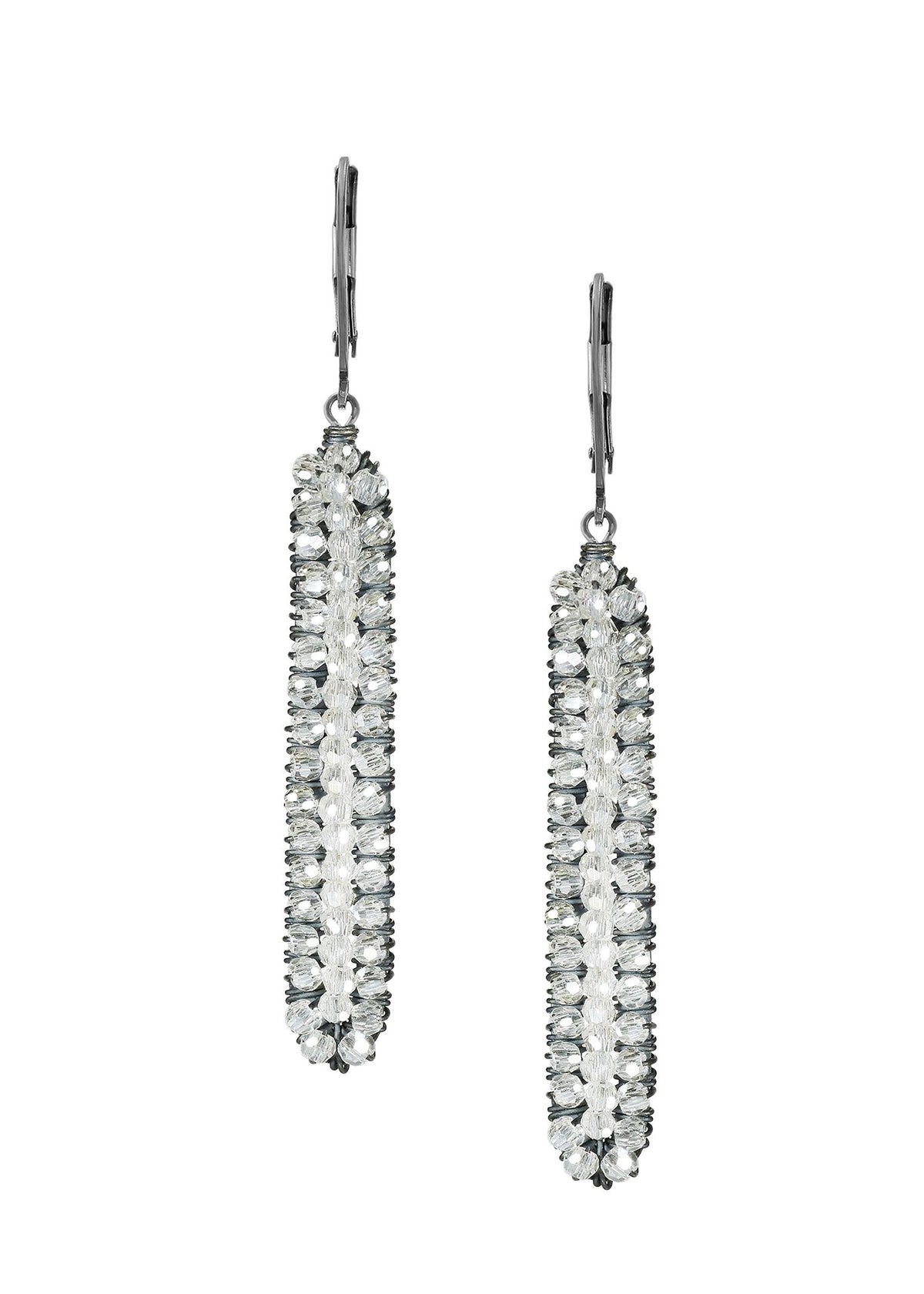 Crystal earrings in sterling silver with hand wire-wrapped clear beads in a long, slender rectangular icicle shape.