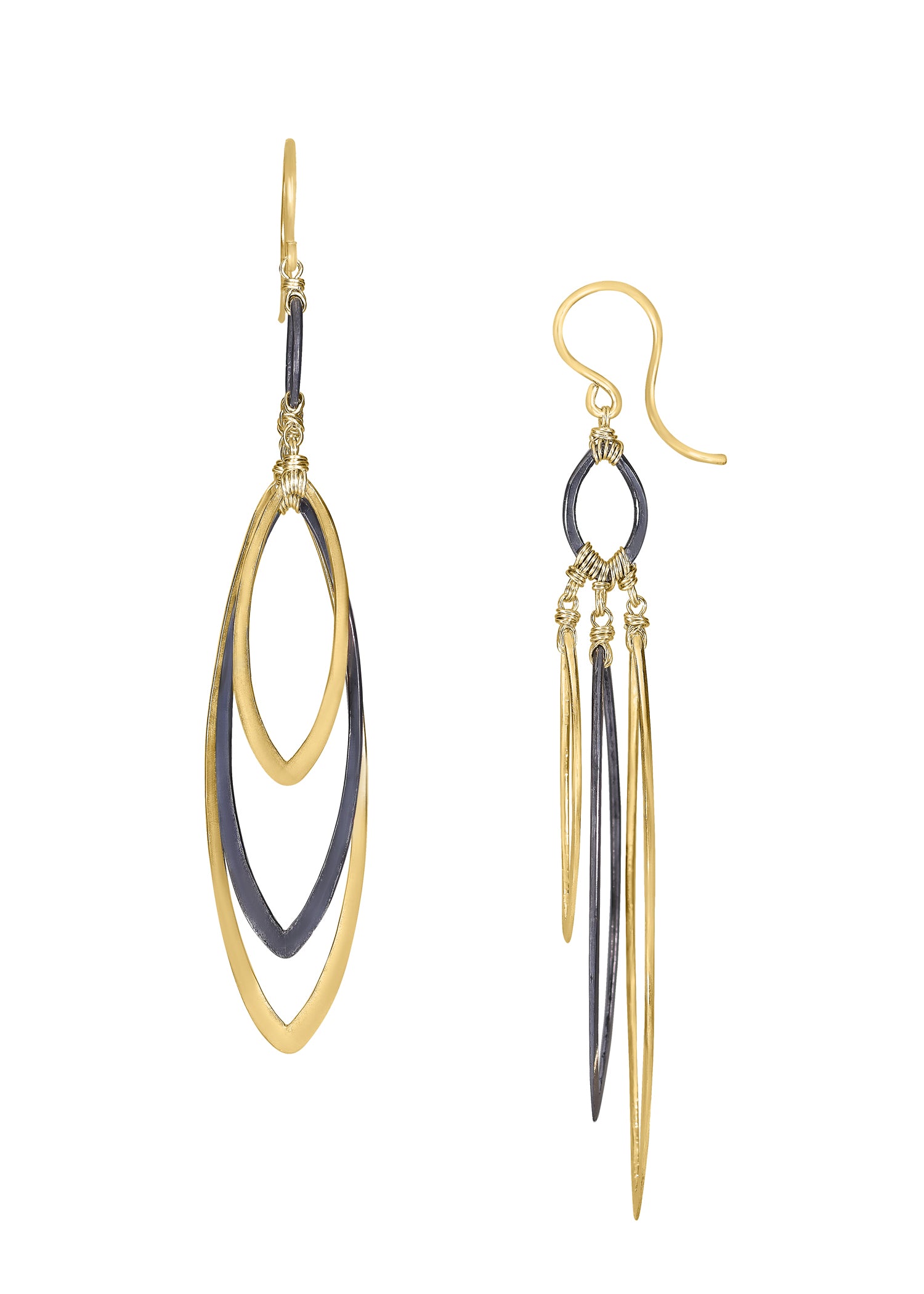 Dangle earrings in 14k gold fill and blackened sterling silver with hand wire-wrapped graduated marquis shapes.