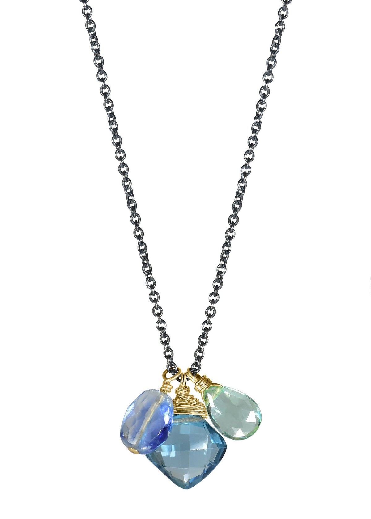 Nesting charm necklace with hand wire-wrapped kyanite, topaz, and fluorite on 14k gold fill and sterling silver chain.