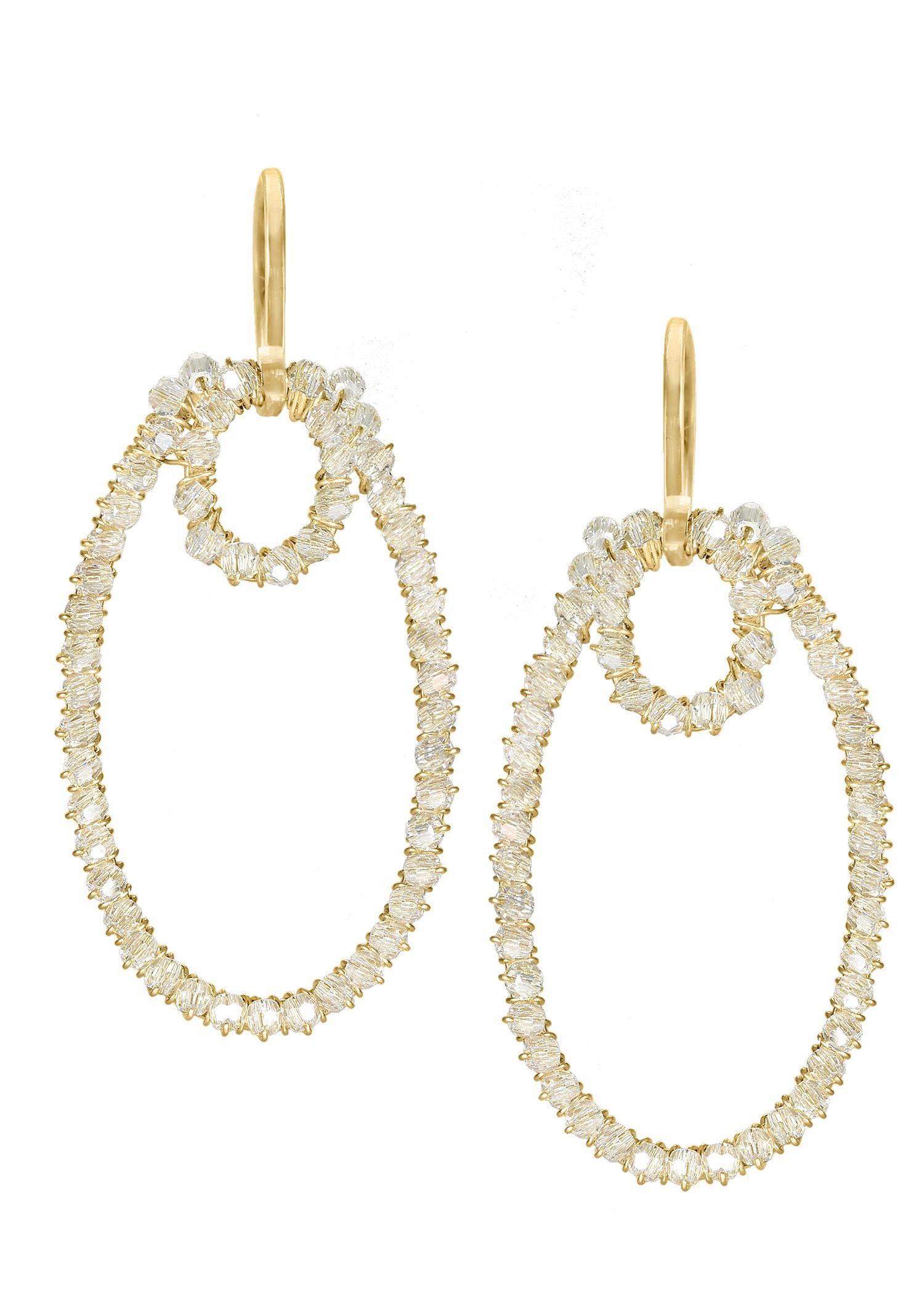Crystal hoop earrings in 14k gold fill featuring a shimmering oval design measuring 1-3/4 inches long and 3/4 inches wide.