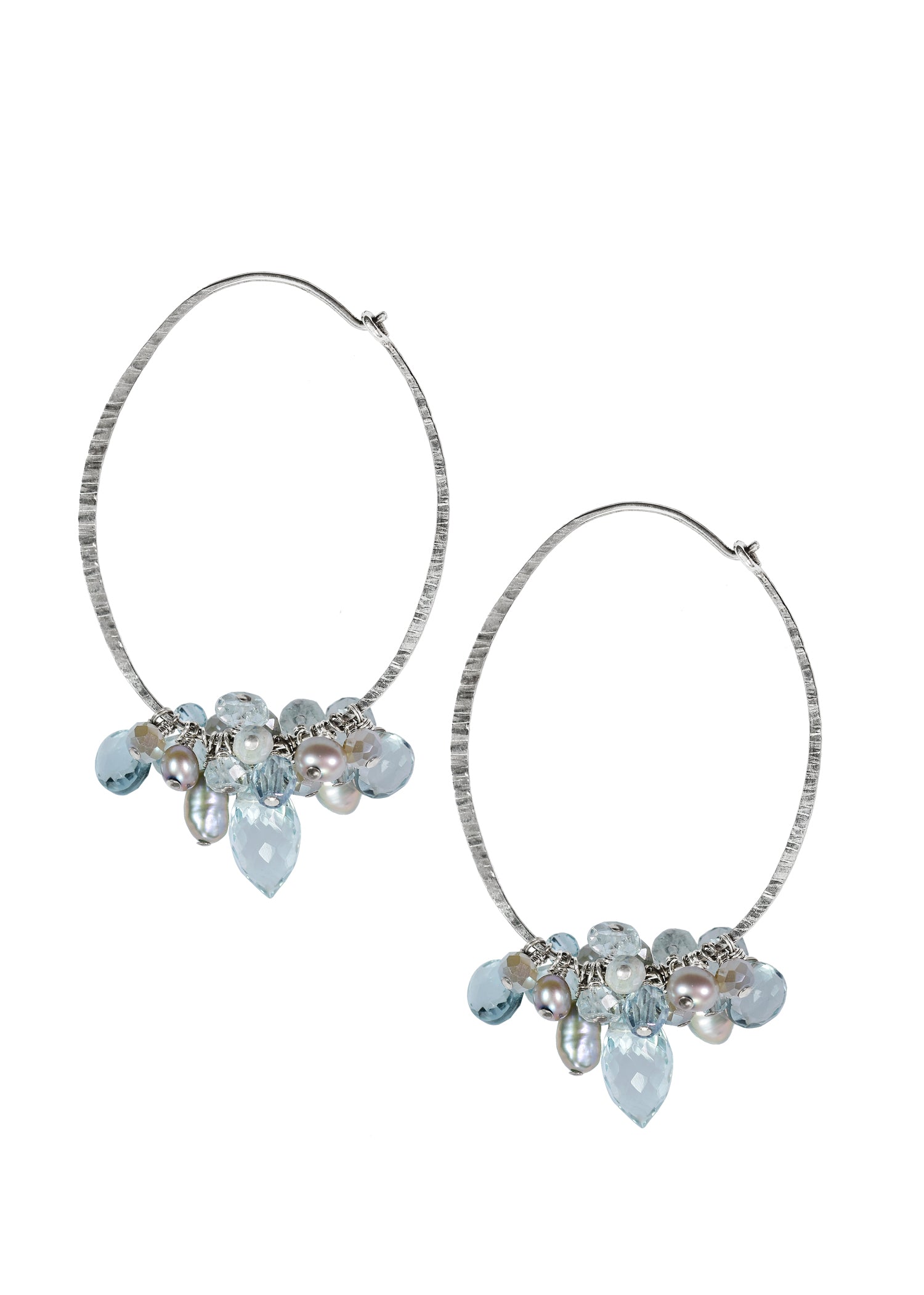 Hoops with aqua quartz, corundum, and freshwater pearls on hand-textured sterling silver, 2 inches long.