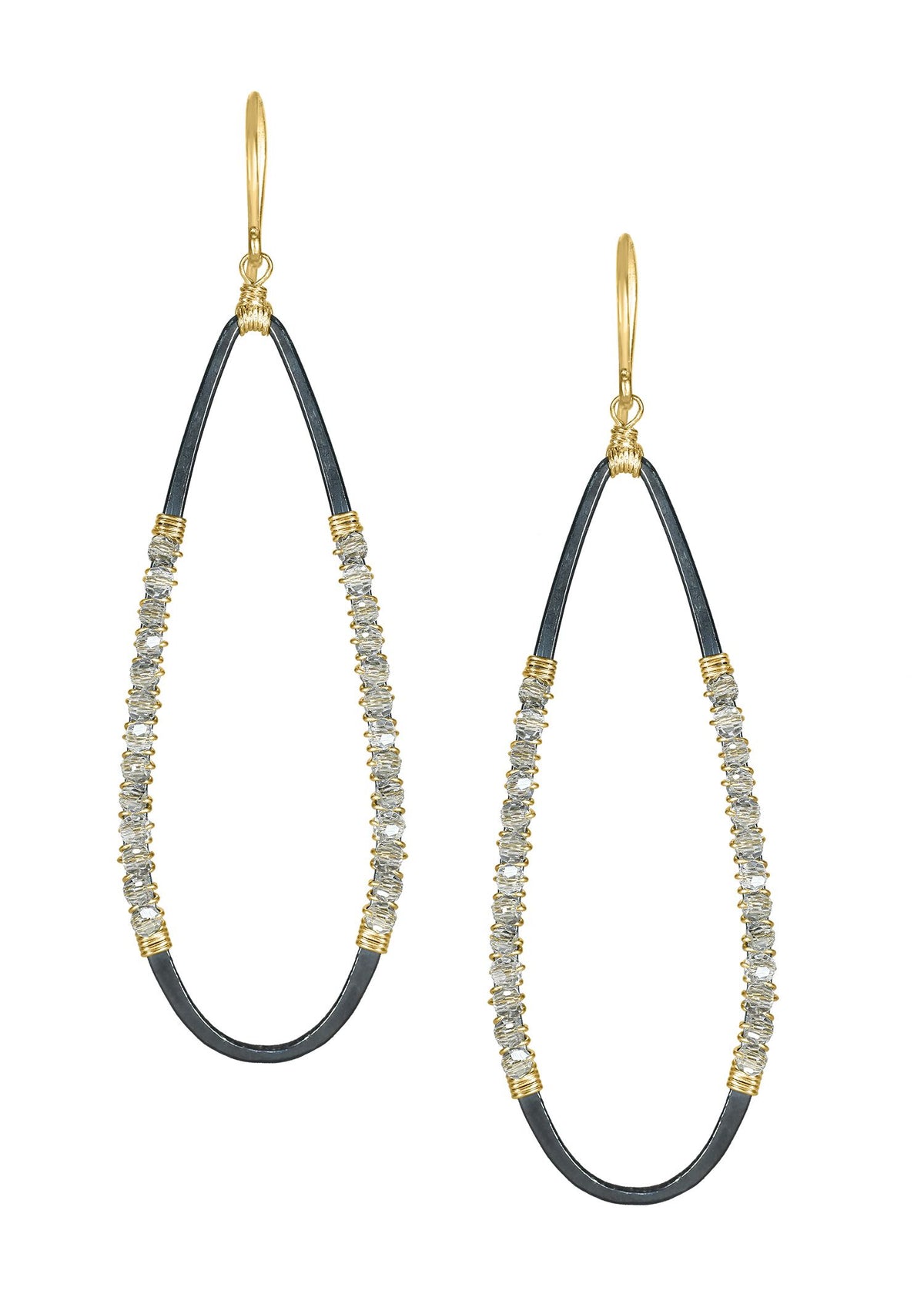 Crystal earrings in 14k gold fill and blackened sterling silver with hand wire-wrapped accents in a lean teardrop shape.