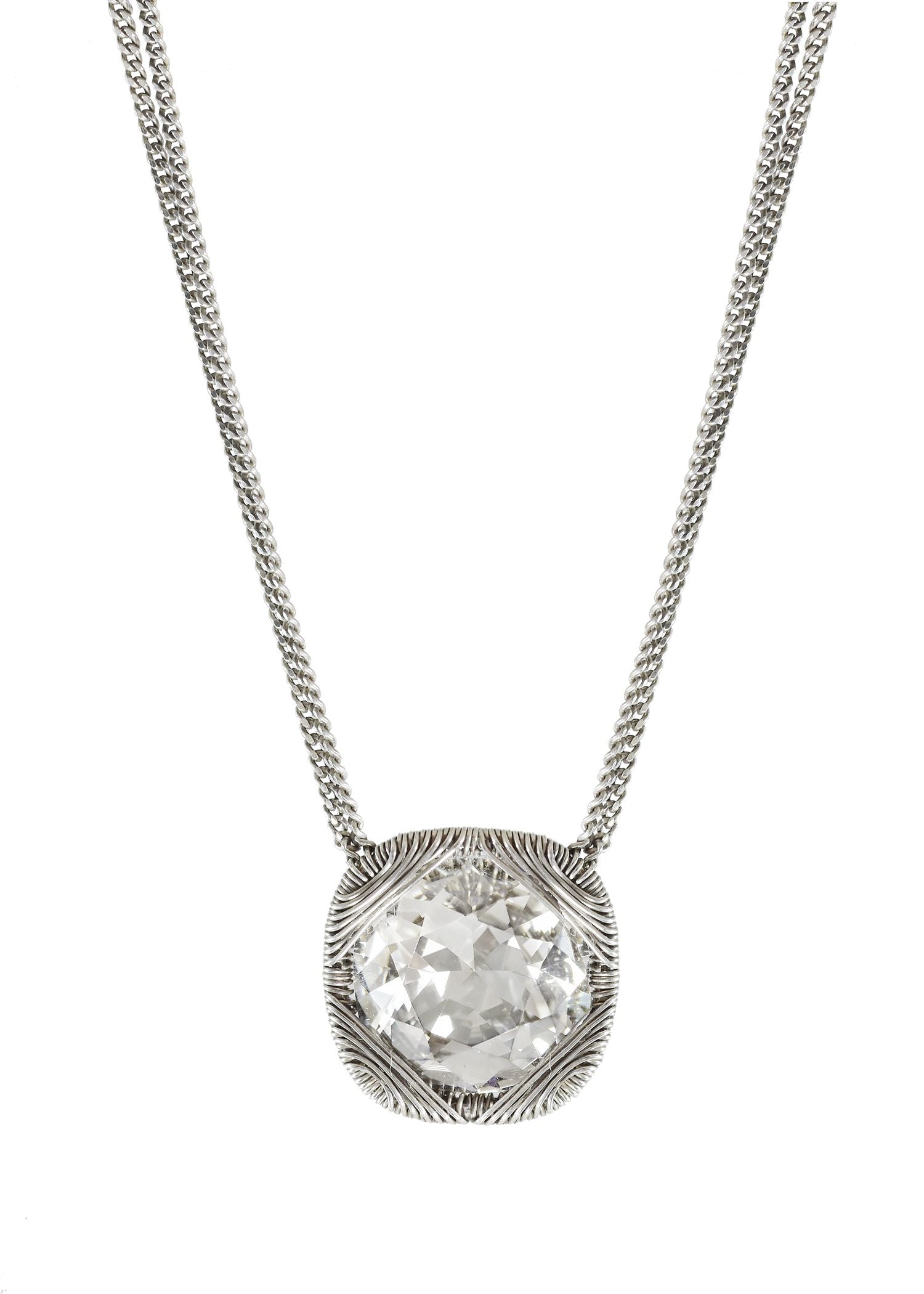 Solitaire crystal necklace in sterling silver with a hand wire-wrapped cocoon setting on a double strand curb chain.