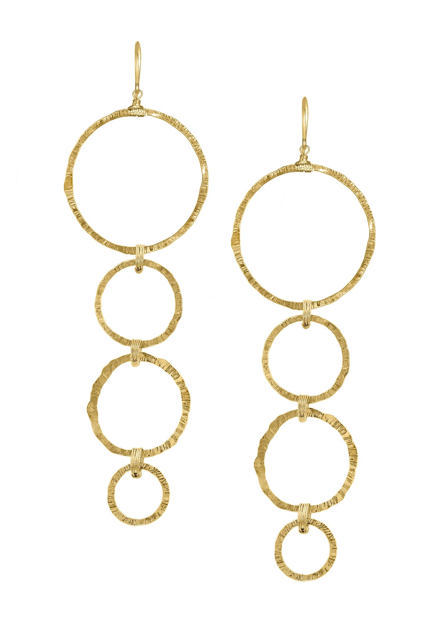 Sunburst earrings in 14k gold fill featuring cascading, textured gold rings with hand wire-wrapped bails.