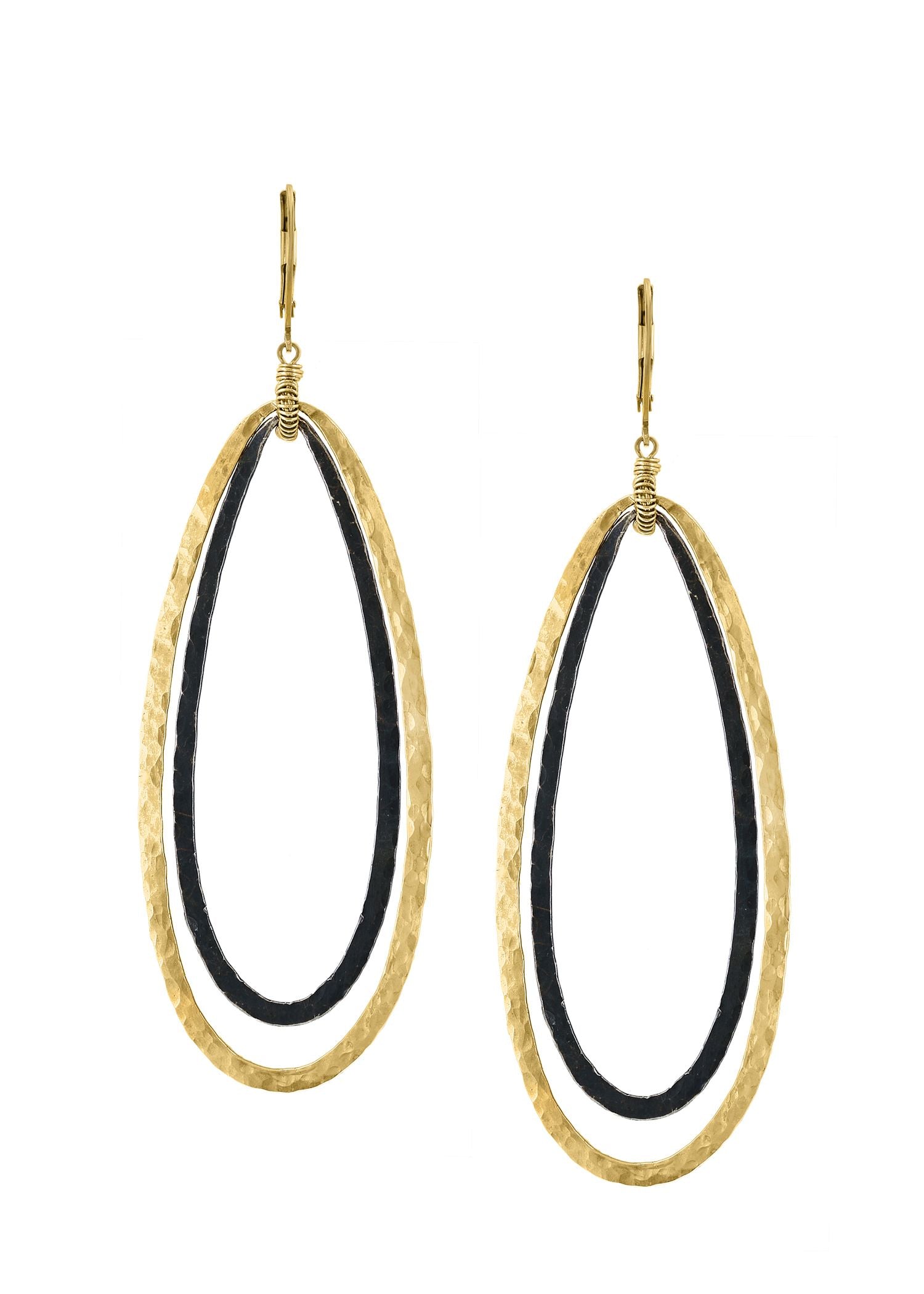 Synergy earrings in 14k gold fill and blackened sterling silver with hand wire-wrapped oblong teardrop hoops.