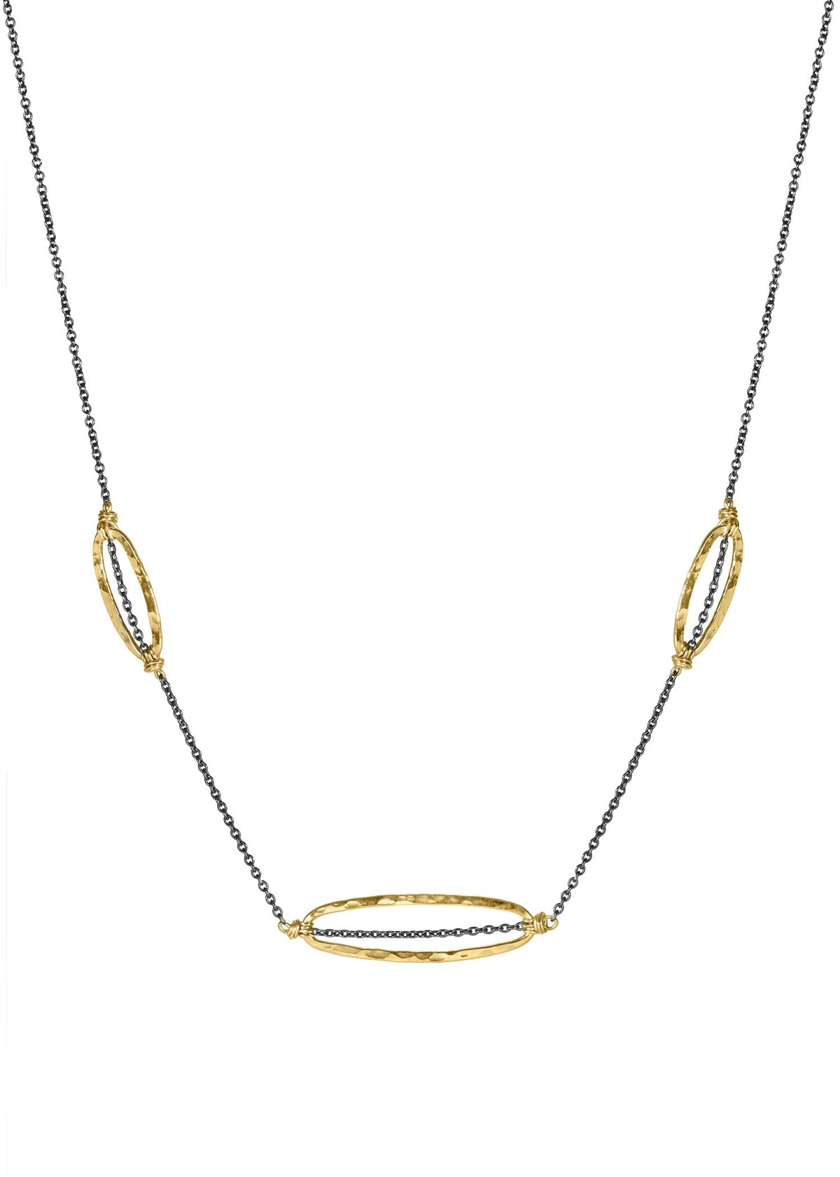 Triple Phi necklace in 14k gold fill and blackened sterling silver with three hand wire-wrapped oval pendants.